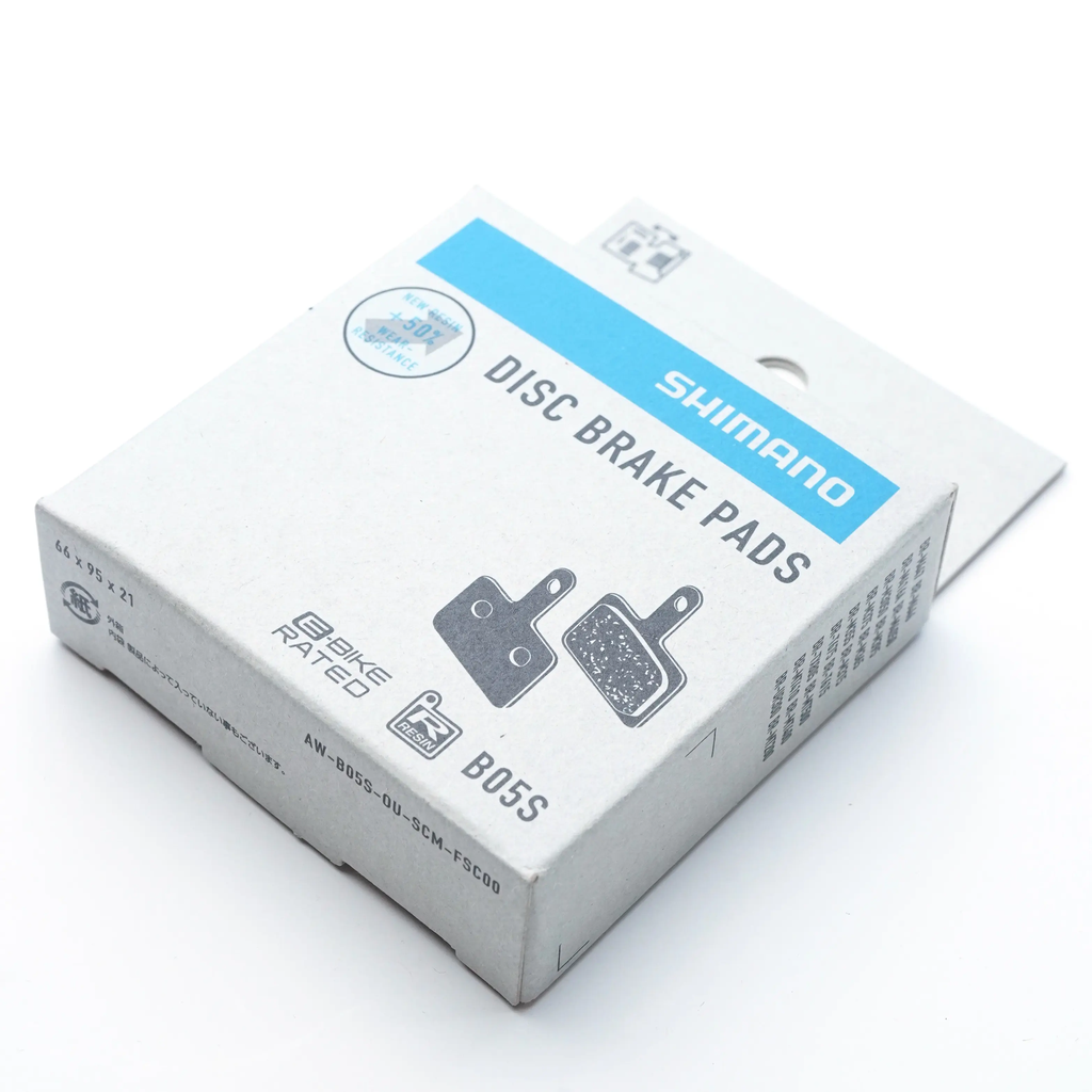 Shimano B05S resin disc brake pads and spring - front of packaging.webp