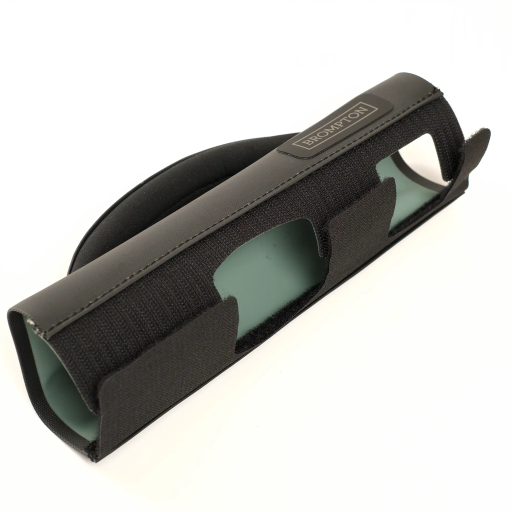 Brompton carry handle - black - showing velcro fastenings on bottom of handle.webp