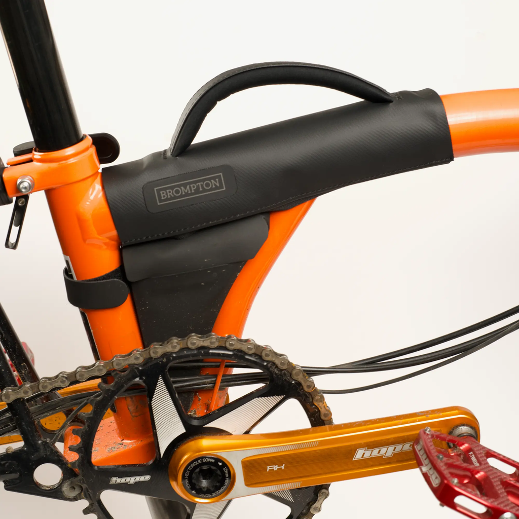 Brompton carry handle - black - on Brompton C Line with puncture pouch installed.webp
