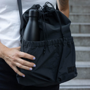 Brompton Musette Bag - Anthracite Black Colour - On Person - stock photo.webp