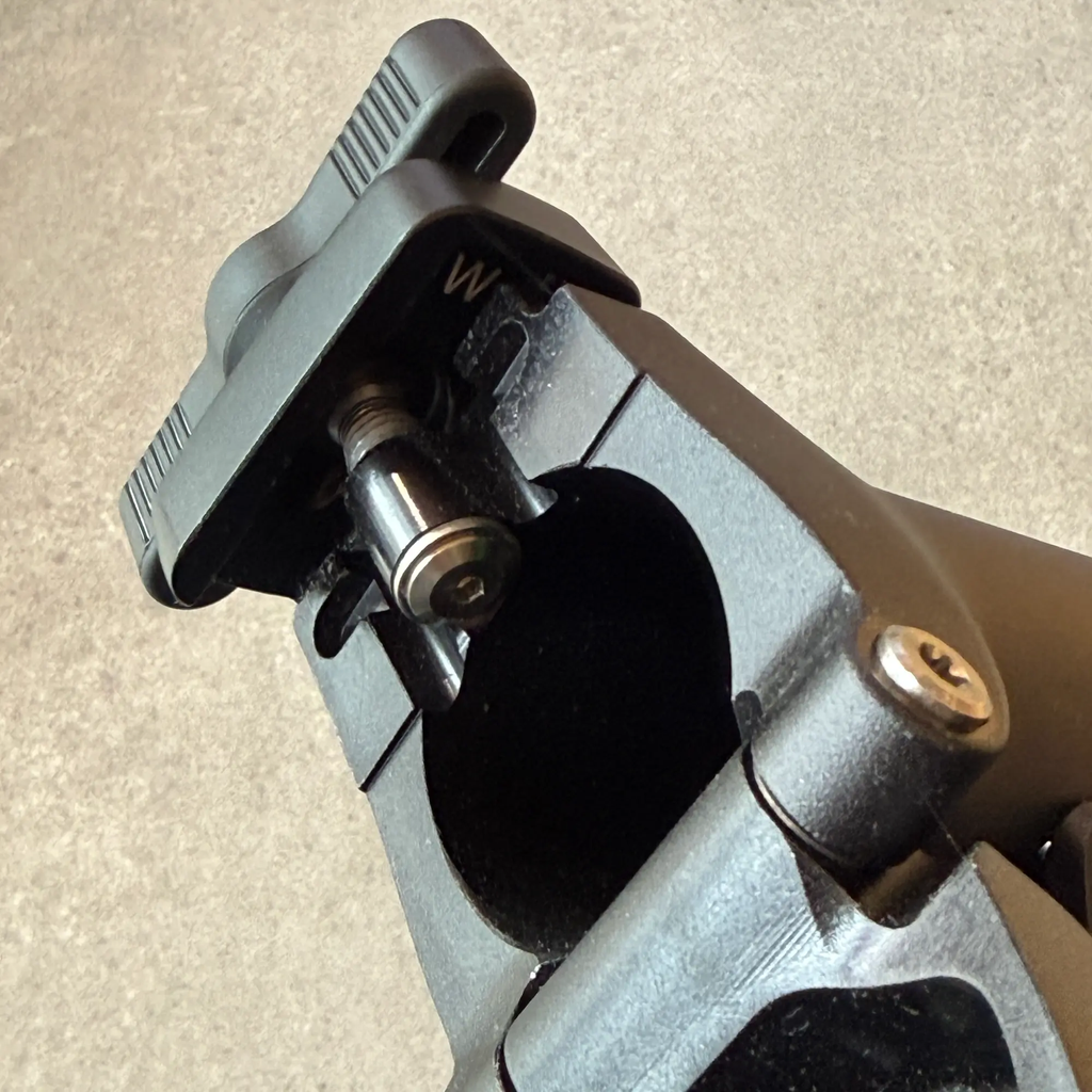 Brompton Anti Rotation Hinge Clamp | Wide | Composite | fitted to P Line MK2 alloy stem whowing screw and W marking.webp
